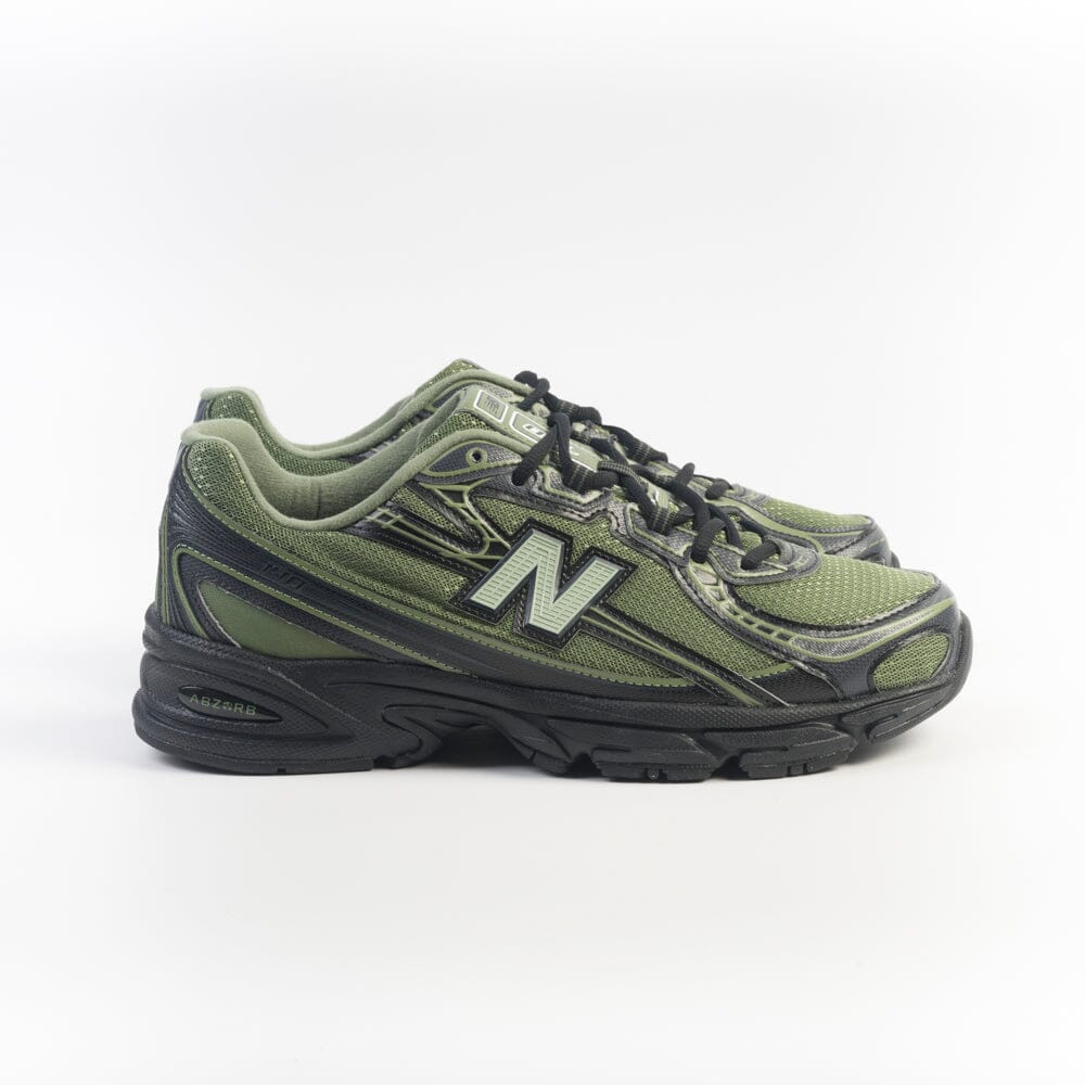 NEW BALANCE - Sneakers U7403DN - Verde nera Scarpe Uomo NEW BALANCE - Collezione Uomo